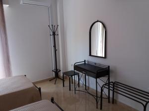 Fotografie z fotogalerie ubytování Nikolakakis Rooms Lavrio v destinaci Lávrion