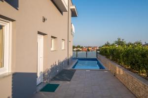 The swimming pool at or close to Luxury Apartment Imperia