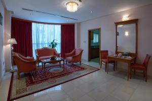 
A seating area at Al Madina Suites Doha
