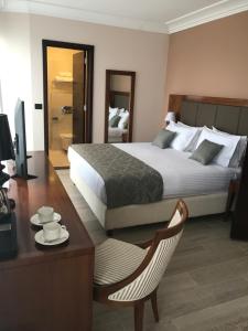 Xenon Hotel & SPA 객실 침대