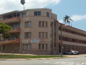 an apartment building on the corner of a street at Uitenhage Apartments in Uitenhage