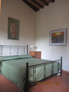 Postel nebo postele na pokoji v ubytování Agriturismo Conca Verde