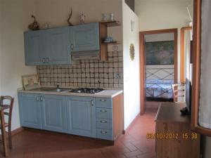 Kuchyň nebo kuchyňský kout v ubytování Agriturismo Conca Verde