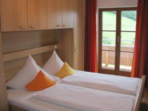 Letto o letti in una camera di Wanishof