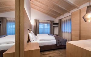 Ένα ή περισσότερα κρεβάτια σε δωμάτιο στο Villa Tony - Small Romantic Hotel