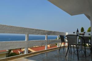 a balcony with a view of the ocean at Apartment Sunny in Bar