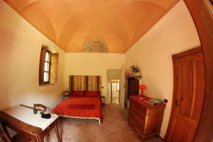Postel nebo postele na pokoji v ubytování B&B Cascina Moncrava