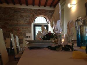 Ein Restaurant oder anderes Speiselokal in der Unterkunft Il Poggiolo Delle Rose Bed&Breakfast 