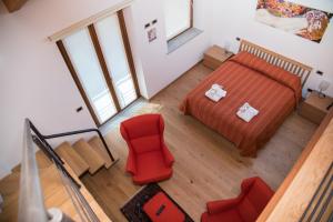 Postel nebo postele na pokoji v ubytování Resort Monviso + 12 fotografií