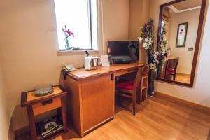 TV a/nebo společenská místnost v ubytování Hotel Bardo Recoletos Coco