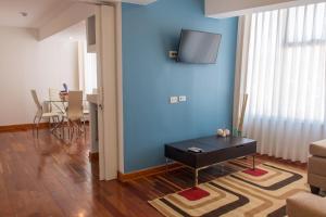 TV a/nebo společenská místnost v ubytování Wayqey Hotel