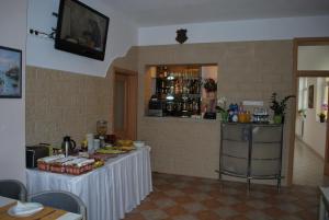 Kuchyň nebo kuchyňský kout v ubytování Főnix Hotel