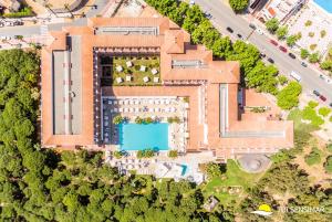 an overhead view of a building with a swimming pool at TUI Blue Isla Cristina Palace - Adults Recommended in Isla Cristina