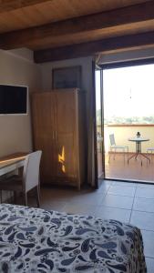 Μια τηλεόραση ή/και κέντρο ψυχαγωγίας στο B&B la taverna degli Angeli