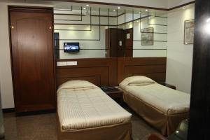 TV a/nebo společenská místnost v ubytování Hotel Karl Residency