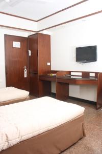 TV a/nebo společenská místnost v ubytování Hotel Karl Residency