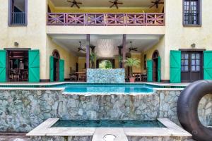 The swimming pool at or close to Toucan Suite @ Mahogany Hall