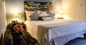 Cama o camas de una habitación en Pousada Bahia Blanca