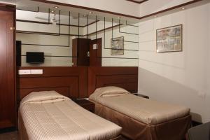 TV a/nebo společenská místnost v ubytování Hotel Karl Residency