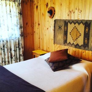 Postel nebo postele na pokoji v ubytování Lomita Quebrada