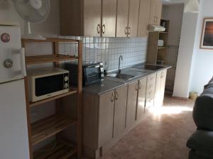 Kuchyňa alebo kuchynka v ubytovaní Arinaga Beach Apartment
