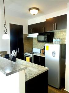 Kuchyň nebo kuchyňský kout v ubytování Apartamentos EcoVivienda