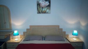 Ένα ή περισσότερα κρεβάτια σε δωμάτιο στο Pinang Beach Apartment @ Bayu Emas