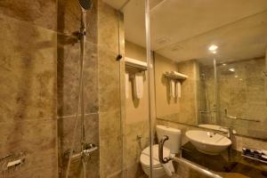 Koupelna v ubytování Serela Waringin by KAGUM Hotels