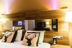 Telewizja i/lub zestaw kina domowego w obiekcie Hotel Salzburg
