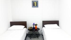 Letto o letti in una camera di Hostel Near The Square