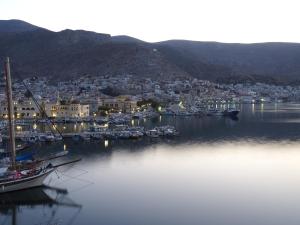 a large body of water with boats docked at Olympic Hotel in Kalymnos
