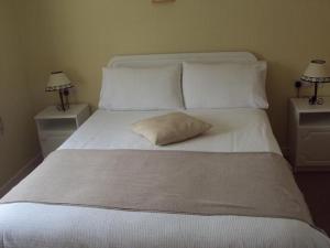 Postel nebo postele na pokoji v ubytování Ryebrook House