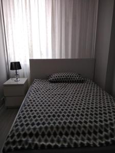 Apartment Plac Bankowy tesisinde bir odada yatak veya yataklar