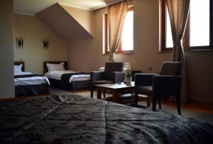 Posteľ alebo postele v izbe v ubytovaní Hotel Moja Čarda