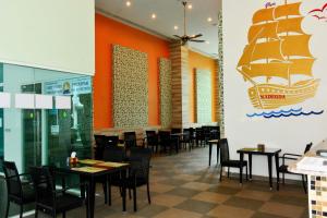 Restaurace v ubytování Amazon Residence Unit B1-217