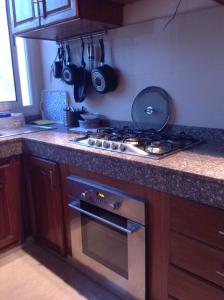 Kuchyň nebo kuchyňský kout v ubytování Cosy Appartement Rabat Haut Agdal + 15 fotografií