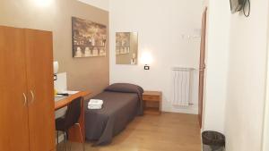 Postel nebo postele na pokoji v ubytování Piumith Guest House
