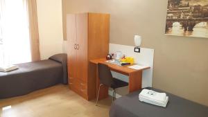 Postel nebo postele na pokoji v ubytování Piumith Guest House