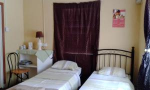 Posteľ alebo postele v izbe v ubytovaní Somewhere Special Guesthouse