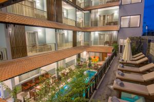 an overhead view of a hotel with a swimming pool at Chhay Long Angkor Boutique Hotel Siem Reap in Siem Reap