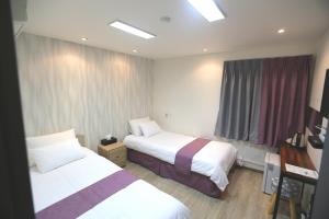 Postel nebo postele na pokoji v ubytování Must Stay Hotel Myeongdong