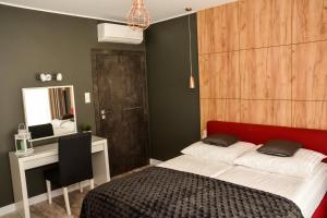 Llit o llits en una habitació de Apartament 34 Gdynia KLIMATYZOWANY