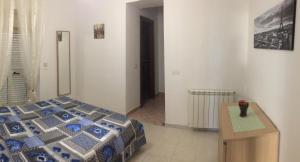 Posteľ alebo postele v izbe v ubytovaní Casa Vacanze il Gelsomino