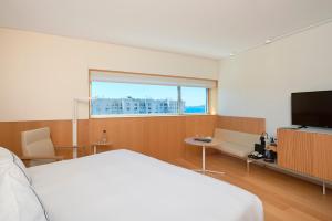 TV a/nebo společenská místnost v ubytování Melia Palma Bay