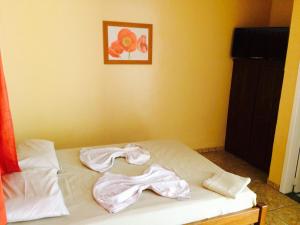 Ein Bett oder Betten in einem Zimmer der Unterkunft Hotel da Lagoa