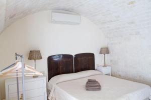 Кровать или кровати в номере Le Chiancarelle, casa vacanza