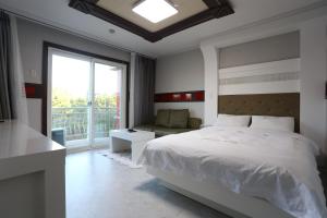 Katil atau katil-katil dalam bilik di Paradaise Motel