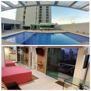 a large swimming pool on top of a building at Apart-Hotel in Goiânia