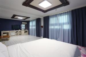 Postel nebo postele na pokoji v ubytování Paradaise Motel + 22 fotografií