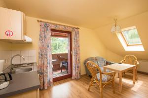 A kitchen or kitchenette at Kärntner Stubn
